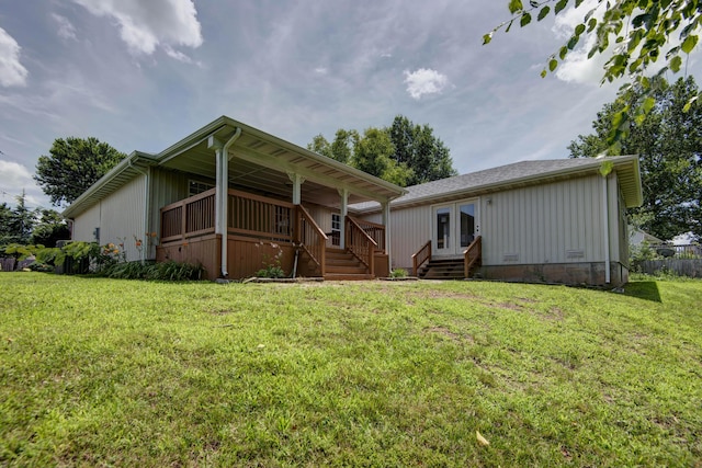 805 S Benson Pl, Nixa, MO 65714 - rear view of property featuring a lawn, french doors, board and batten siding, and entry steps