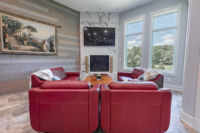 6323 Creeksedge Ct, Ozark, MO 65721 - living area featuring a high end fireplace and stone finish floors