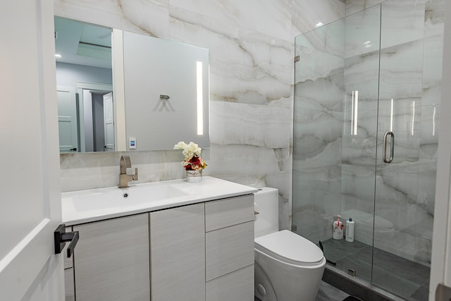 6323 Creeksedge Ct, Ozark, MO 65721 - bathroom featuring tile walls, vanity, and a marble finish shower