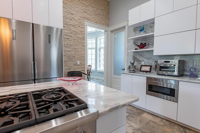 6323 Creeksedge Ct, Ozark, MO 65721 - kitchen featuring appliances with stainless steel finishes, modern cabinets, open shelves, and white cabinets