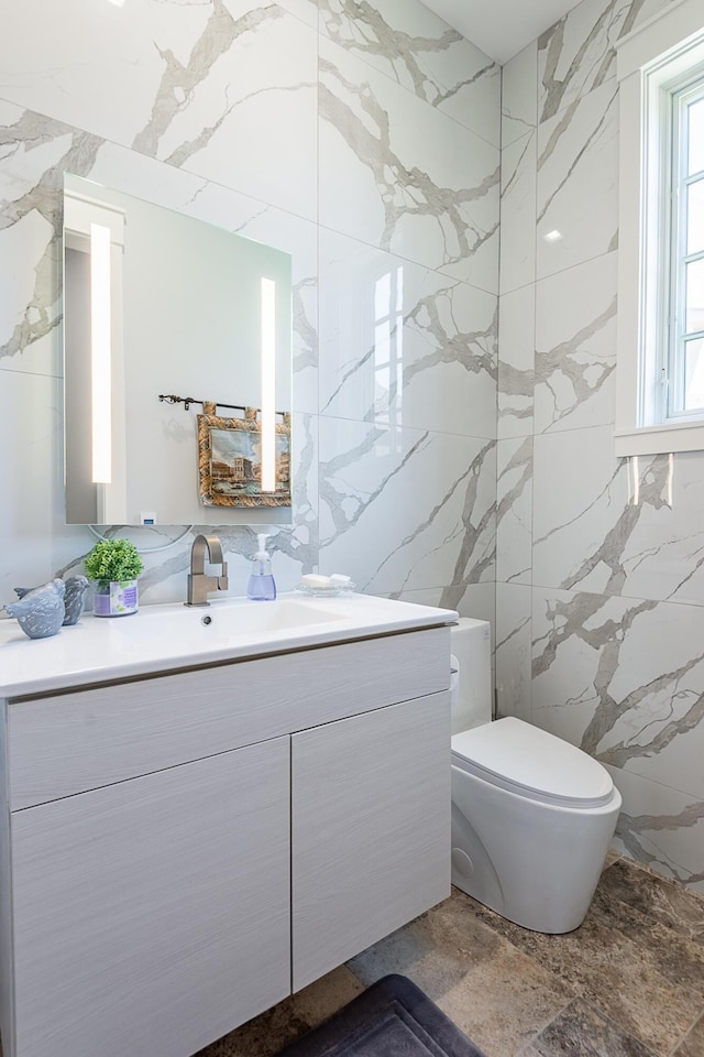 6323 Creeksedge Ct, Ozark, MO 65721 - bathroom featuring tile walls and vanity