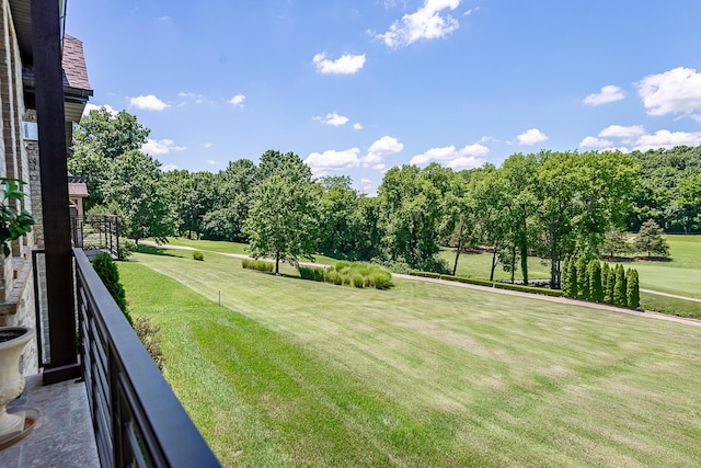 6323 Creeksedge Ct, Ozark, MO 65721 - view of green lawn featuring view of scattered trees and a balcony