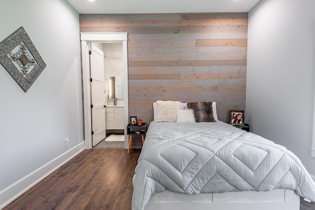 6323 Creeksedge Ct, Ozark, MO 65721 - bedroom with wooden walls, dark wood finished floors, connected bathroom, and recessed lighting