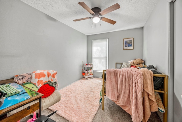 2515 S Newton Ave, Springfield, MO 65807 - bedroom with carpet flooring, a textured ceiling, and ceiling fan
