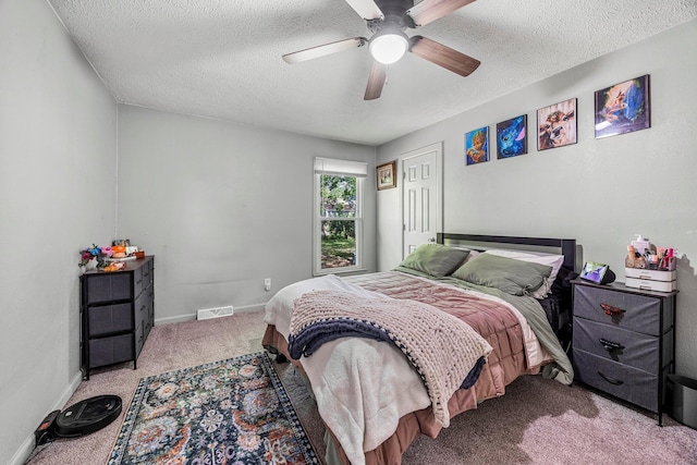 2515 S Newton Ave, Springfield, MO 65807 - bedroom featuring carpet, a textured ceiling, and a ceiling fan