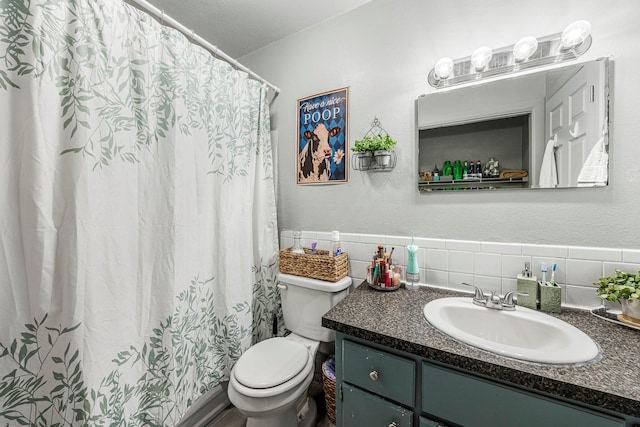 2515 S Newton Ave, Springfield, MO 65807 - full bath featuring vanity, tile walls, and a shower with curtain