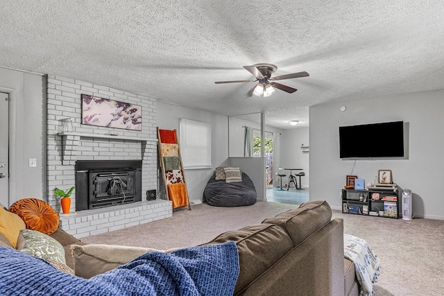 2515 S Newton Ave, Springfield, MO 65807 - living area featuring carpet flooring, a ceiling fan, a brick fireplace, and a textured ceiling