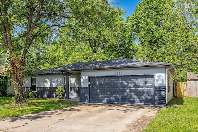 2515 S Newton Ave, Springfield, MO 65807 - single story home with concrete driveway and a garage