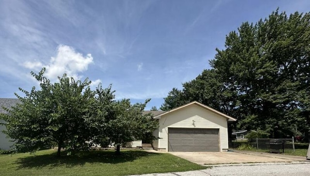 2201 S 18th Ave, Ozark, MO 65721 - view of front facade featuring concrete driveway and a garage