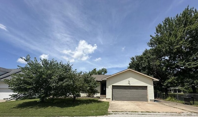 2201 S 18th Ave, Ozark, MO 65721 - view of front of property featuring concrete driveway, an attached garage, and a front lawn