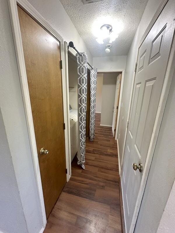 2201 S 18th Ave, Ozark, MO 65721 - corridor with wood finished floors and a textured ceiling