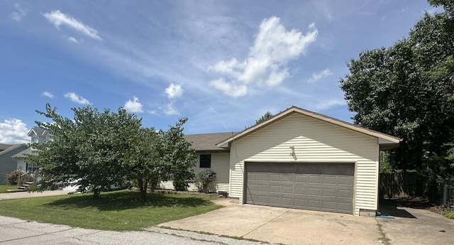 2201 S 18th Ave, Ozark, MO 65721 - view of front of house featuring driveway, a garage, and a front yard