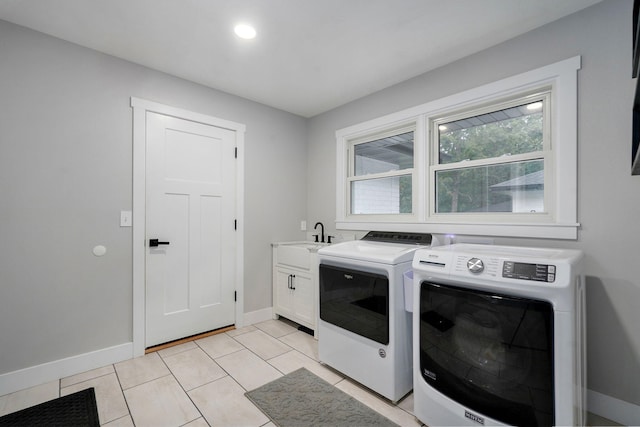 12163 State Highway Tt, Republic, MO 65738 - washroom featuring cabinet space, washer and clothes dryer, light tile patterned floors, and recessed lighting