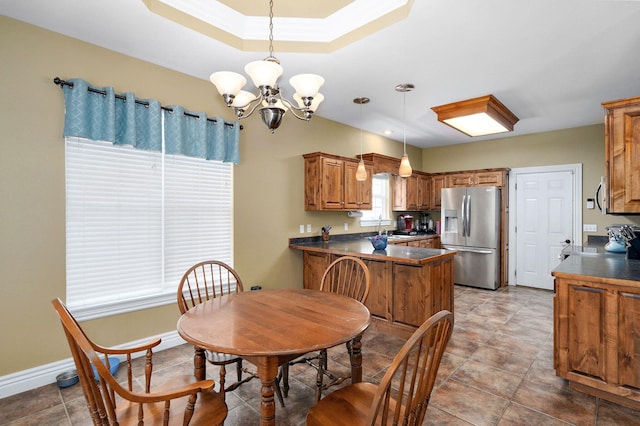 823 Mcvey St, Mount Vernon, MO 65712 - dining room with a chandelier and tile patterned floors