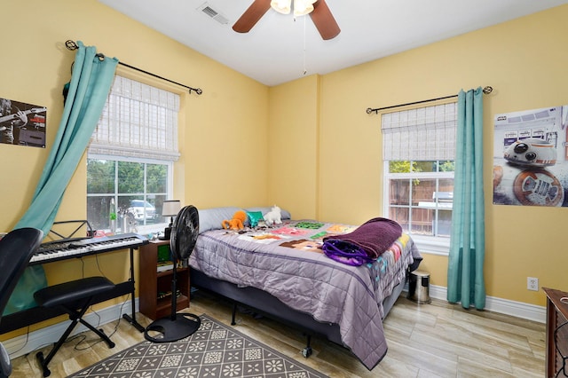 823 Mcvey St, Mount Vernon, MO 65712 - bedroom with wood finished floors and a ceiling fan
