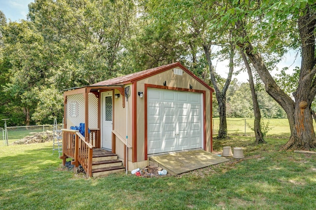 823 Mcvey St, Mount Vernon, MO 65712 - garage with view of wooded area