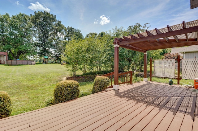 823 Mcvey St, Mount Vernon, MO 65712 - wooden deck featuring a pergola and a lawn