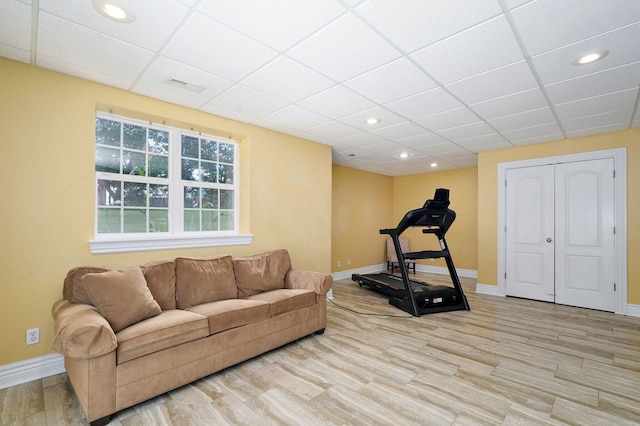 823 Mcvey St, Mount Vernon, MO 65712 - workout area featuring light wood finished floors, a drop ceiling, and recessed lighting