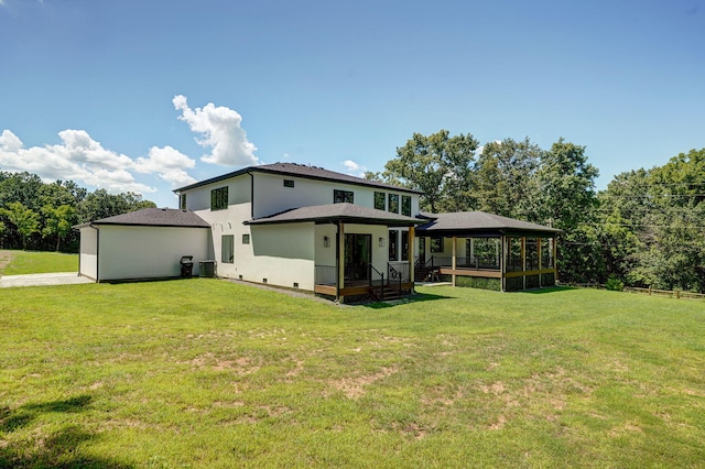 104 Walnut Hill Ln, Ozark, MO 65721 - back of property with a lawn and stucco siding