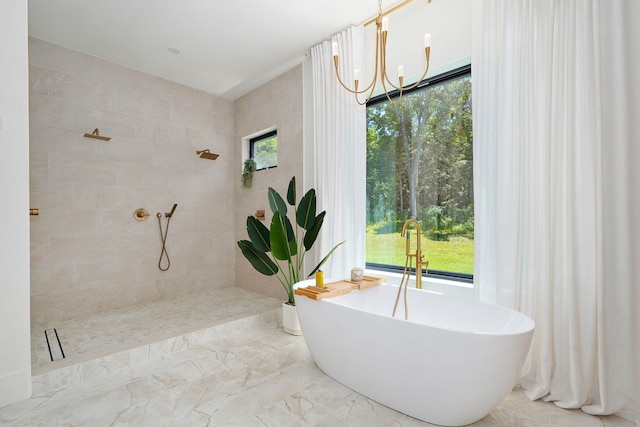104 Walnut Hill Ln, Ozark, MO 65721 - bathroom with a freestanding bath, a tile shower, plenty of natural light, and marble finish flooring