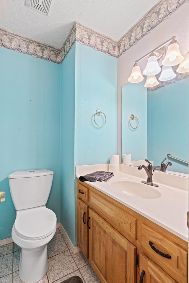 8756 W Farm Rd Unit 124, Springfield, MO 65802 - bathroom with vanity, a textured ceiling, and tile patterned floors