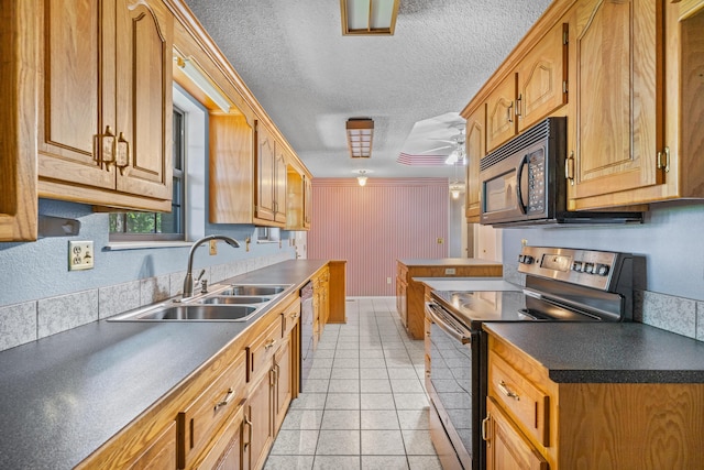 8756 W Farm Rd Unit 124, Springfield, MO 65802 - kitchen with stainless steel range with electric stovetop, black microwave, ceiling fan, dishwasher, and dark countertops