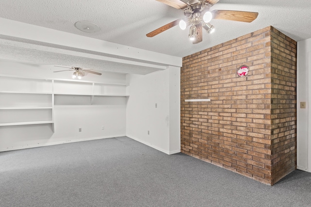 8756 W Farm Rd Unit 124, Springfield, MO 65802 - carpeted spare room with ceiling fan, brick wall, and a textured ceiling
