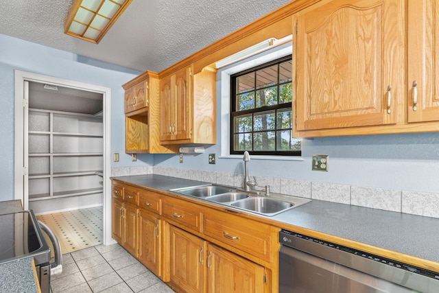 8756 W Farm Rd Unit 124, Springfield, MO 65802 - kitchen featuring dishwashing machine, electric range, a textured ceiling, light tile patterned floors, and dark countertops