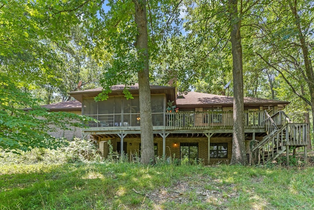 8756 W Farm Rd Unit 124, Springfield, MO 65802 - back of property featuring a sunroom, a deck, and stairway