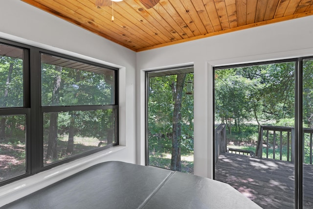 8756 W Farm Rd Unit 124, Springfield, MO 65802 - unfurnished bedroom with wood ceiling and access to exterior