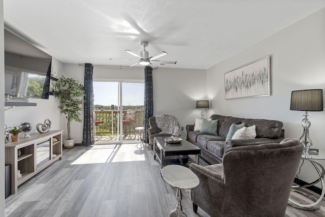 2915 Vineyards Pkwy Unit 6, Branson, MO 65616 - living room with plenty of natural light, ceiling fan, and wood finished floors