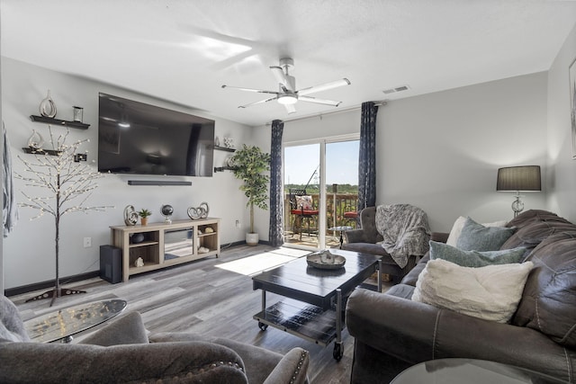 2915 Vineyards Pkwy Unit 6, Branson, MO 65616 - living room with wood finished floors and ceiling fan