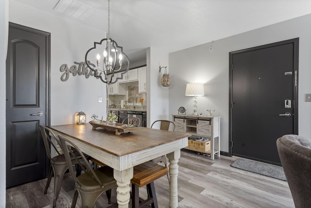 2915 Vineyards Pkwy Unit 6, Branson, MO 65616 - dining space with a chandelier and light wood finished floors
