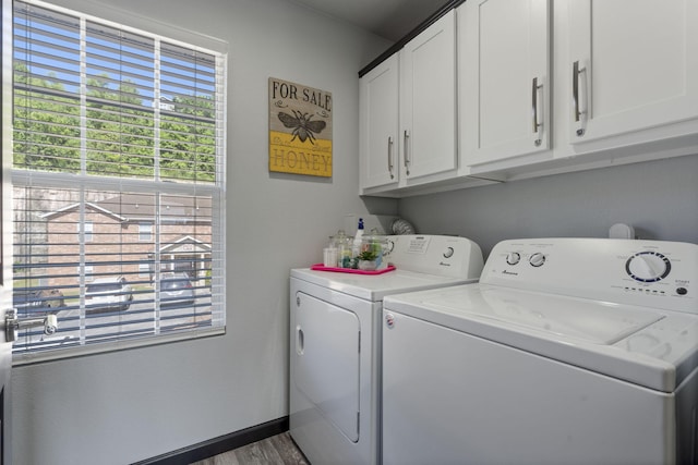 2915 Vineyards Pkwy Unit 6, Branson, MO 65616 - laundry room with cabinet space, washer and dryer, and wood finished floors
