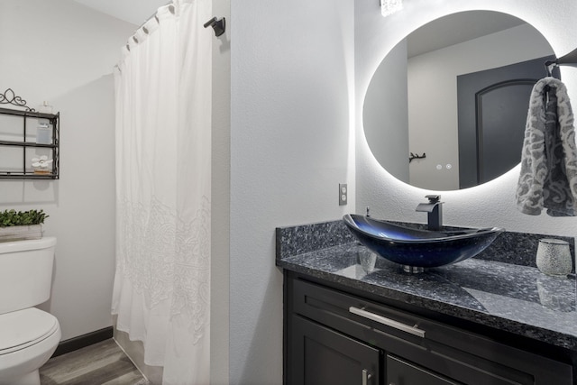 2915 Vineyards Pkwy Unit 6, Branson, MO 65616 - full bathroom featuring vanity, wood finished floors, and a shower with shower curtain