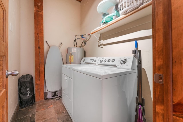 509 W Olive St Unit 206, Springfield, MO 65806 - laundry area featuring water heater, washing machine and clothes dryer, and stone finish floors