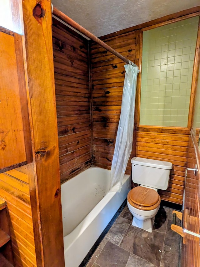 13802 E State Highway 76, Taneyville, MO 65759 - full bath with shower / bath combo with shower curtain, wood walls, and a textured ceiling
