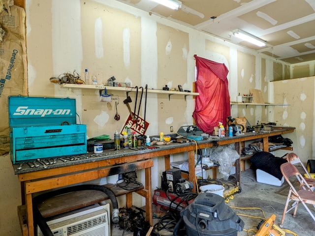 13802 E State Highway 76, Taneyville, MO 65759 - miscellaneous room featuring a workshop area and unfinished concrete flooring