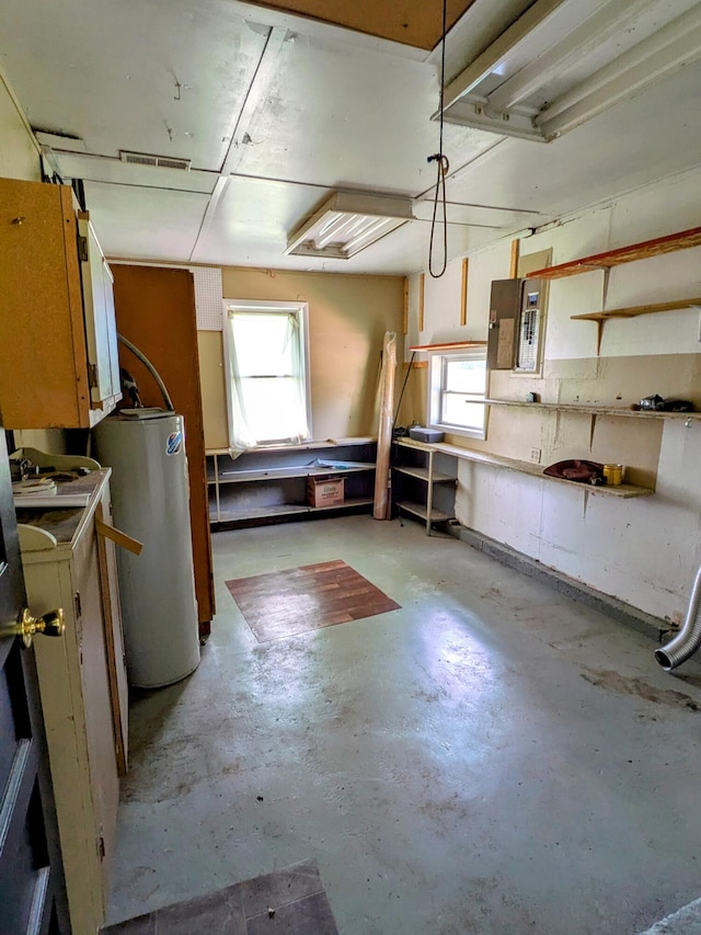 13802 E State Highway 76, Taneyville, MO 65759 - below grade area with a workshop area, gas water heater, healthy amount of natural light, and electric panel