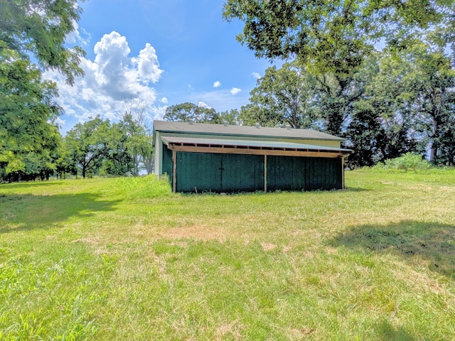 13802 E State Highway 76, Taneyville, MO 65759 - view of grassy yard with an outbuilding and an outdoor structure