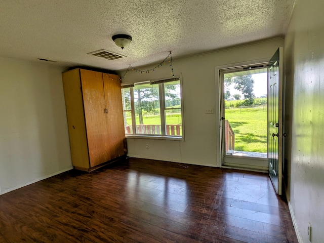 13802 E State Highway 76, Taneyville, MO 65759 - interior space featuring a textured ceiling and wood finished floors