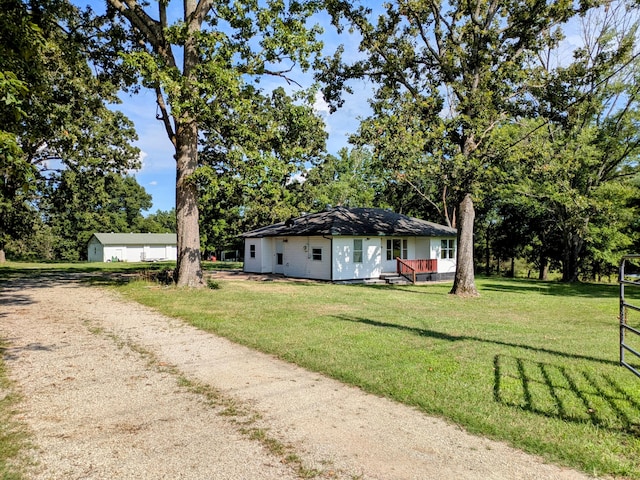 13802 E State Highway 76, Taneyville, MO 65759 - ranch-style house with dirt driveway, a front yard, and a deck