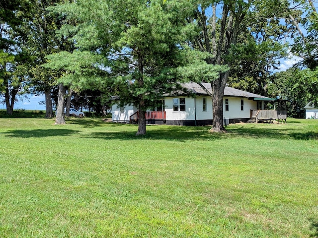 13802 E State Highway 76, Taneyville, MO 65759 - view of grassy yard featuring a deck