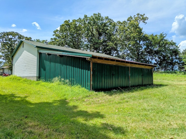 13802 E State Highway 76, Taneyville, MO 65759 - view of pole building featuring a lawn