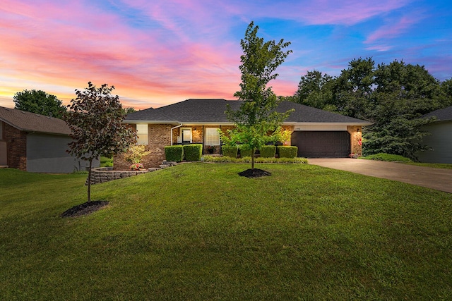 2602 S 15th Ave, Ozark, MO 65721 - single story home with concrete driveway, a garage, a yard, and brick siding