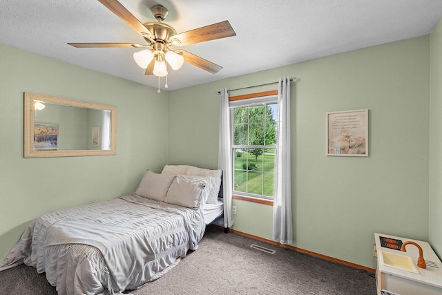 2602 S 15th Ave, Ozark, MO 65721 - carpeted bedroom with baseboards and ceiling fan