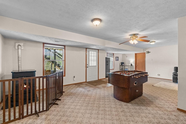 2602 S 15th Ave, Ozark, MO 65721 - game room with light colored carpet, a textured ceiling, and ceiling fan