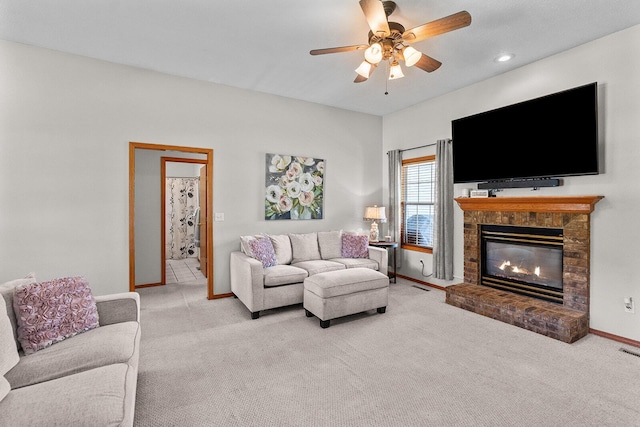 2602 S 15th Ave, Ozark, MO 65721 - living area with carpet flooring, a ceiling fan, a fireplace, and recessed lighting
