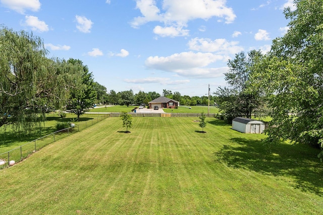 2602 S 15th Ave, Ozark, MO 65721 - view of yard with a storage unit and a rural view
