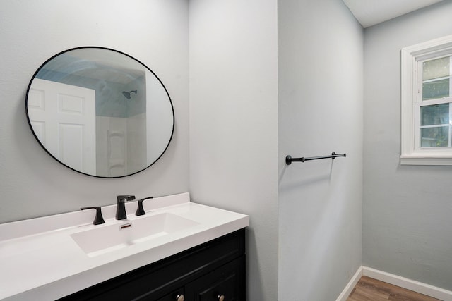 1020 Gretchen St, Nixa, MO 65714 - bathroom featuring vanity and wood finished floors